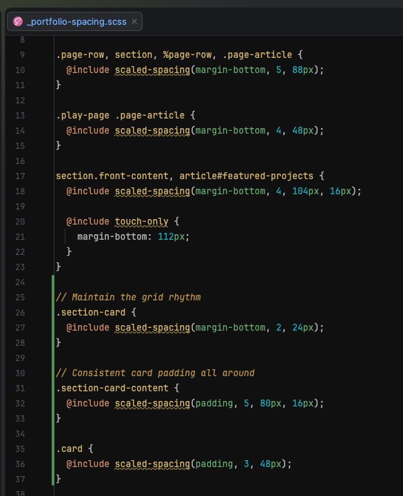 Screenshot of a code editor displaying a SCSS file with spacing rules for portfolio elements, using mixins like scaled-spacing and touch-only, with green comments describing grid rhythm and card padding.