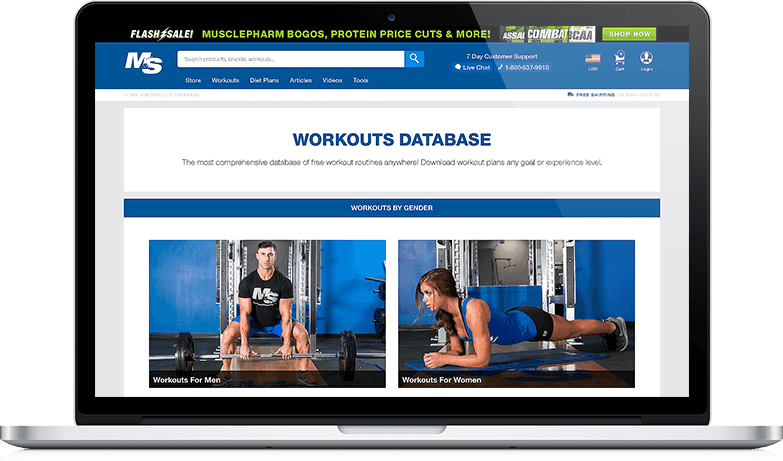 A laptop screen displays a website’s workouts database, featuring sections for men and women. Each section shows a person exercising—one with a barbell, the other doing a plank—on a weight room floor.